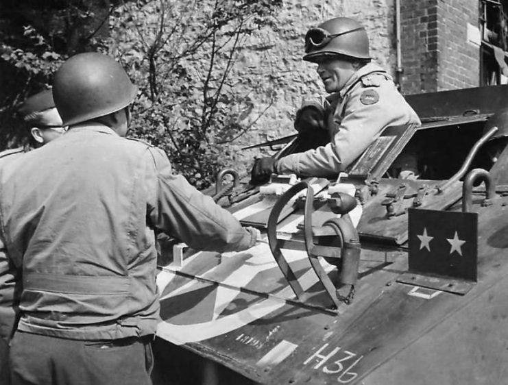 US VII Corps Major General J. Lawton Collins in his M8 in Eupen Belgium 1944.