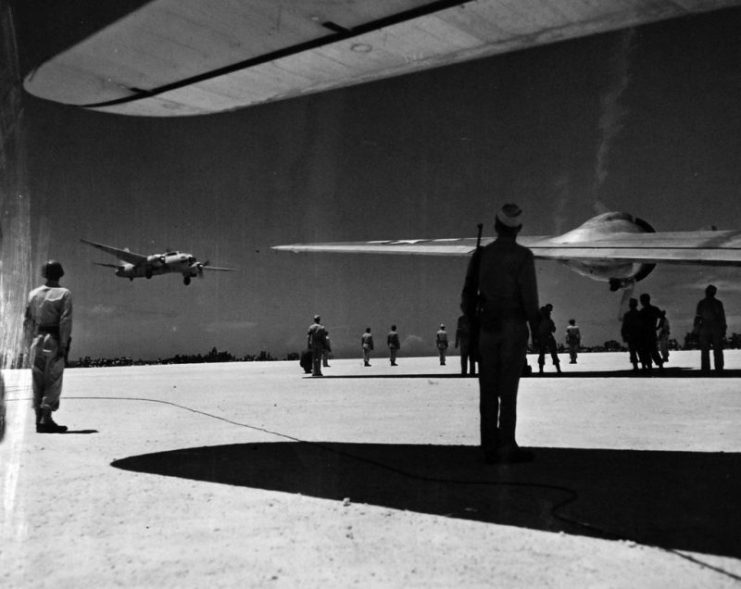 Surrender of Japan, August-September 1945. After circling three times, a Japanese Mitsubishi G4M “Betty” which carried the envoys from Japan landed at Ie Shima airfield.