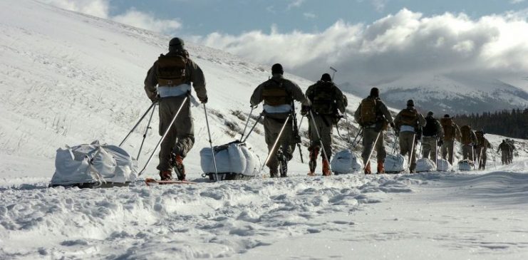 Soldiers from A Co., 3rd Battalion, 10th Special Forces Group (Airborne), conduct the culmination exercise of a five day cold weather exposure training course on Jan 22, 2010. The Green Berets from Fort Carson spent two days in the woods of the Gunnison National Forest performing team movements.