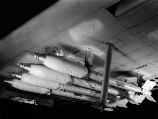 5-Inch Forward Firing Aircraft Rockets (FFARs) mounted on a Douglas SBD Dauntless dive-bomber at Harvey Field, Inyokern, California.