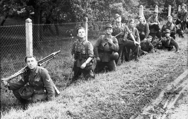 German infantrymen scan the skies for Allied aircraft in Normandy, 1944