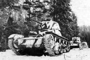 A column of T-26 mod. 1939 and T-26 mod. 1933 light tanks from the 20th Tank Brigade move towards a front line. The Western Front, Battle of Moscow. December 1941.