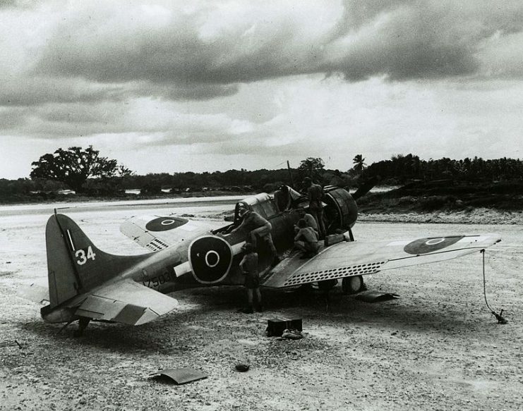 A Douglas SBD-4 Dauntless assigned to the Royal New Zealand Air Force receives the attention of ground personnel on Espiritu Santo, in 1944.