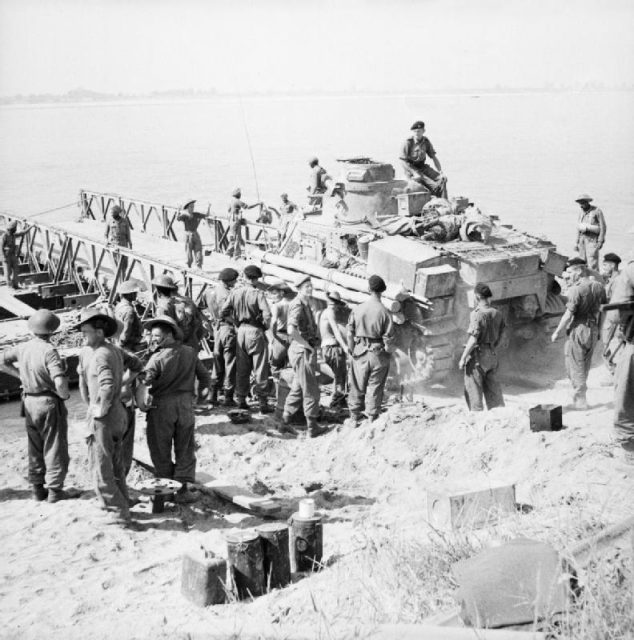 A Lee tank being loaded onto a pontoon ferry