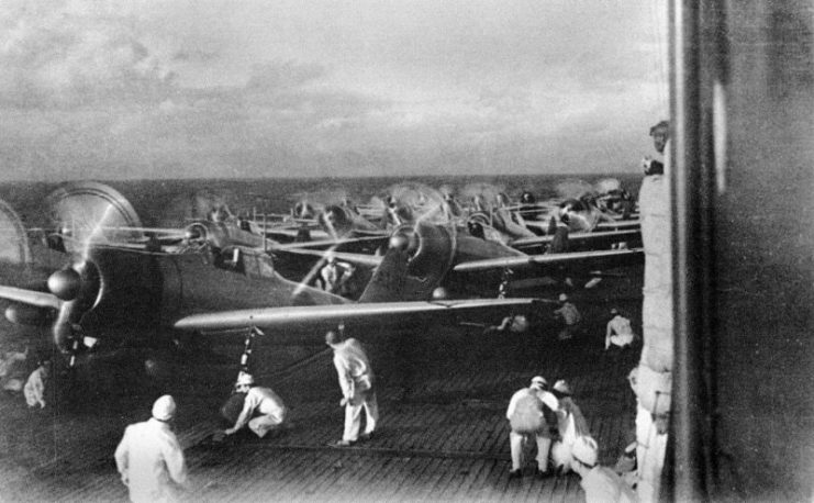 A6M2 Zero fighters prepare to launch from Akagi as part of the second wave during the attack on Pearl Harbor