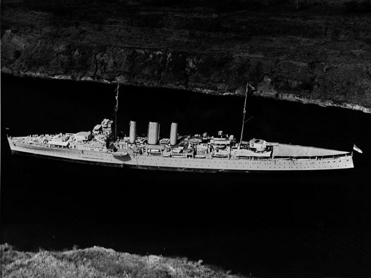 Aerial photograph of the Royal Australian Navy heavy cruiser HMAS Australia (D84) passing through the Panama Canal, March 1935.