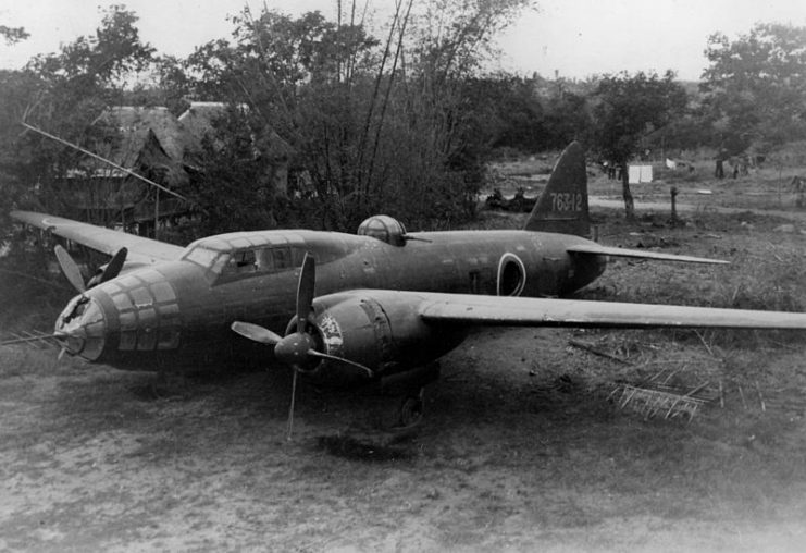 An Imperial Japanese Navy Mitsubishi G4M “Betty” bomber (probably a G4M2a Model 24 Ko Otsu) pictured somewhere in the Southwest Pacific. Note the radar antenna.