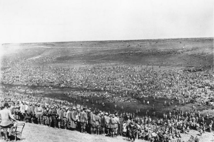 An improvised camp for Soviet POWs. Between June 1941 and January 1942, the Nazis killed an estimated 2.8 million Soviet prisoners of war, whom they viewed as “subhuman”.Photo: Bundesarchiv, Bild 183-B21845 / Wahner / CC-BY-SA 3.0