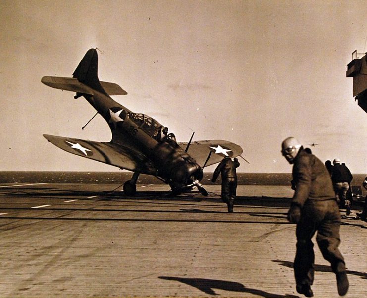 Barrier crash of SBD-4 positioned on deck of USS Charger (ACV 30).1943