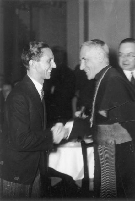 Nazi propaganda minister Goebbels welcomes Nuncio Orsenigo to the Propaganda Ministry.Photo:Bundesarchiv, Bild 183-H26877 / CC-BY-SA 3.0