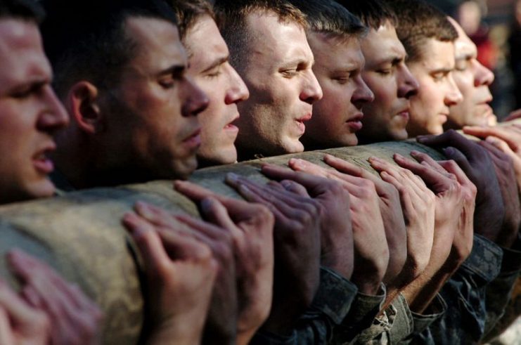 Candidates in SFAS class 04-10 participate in logs drills in January 2010.