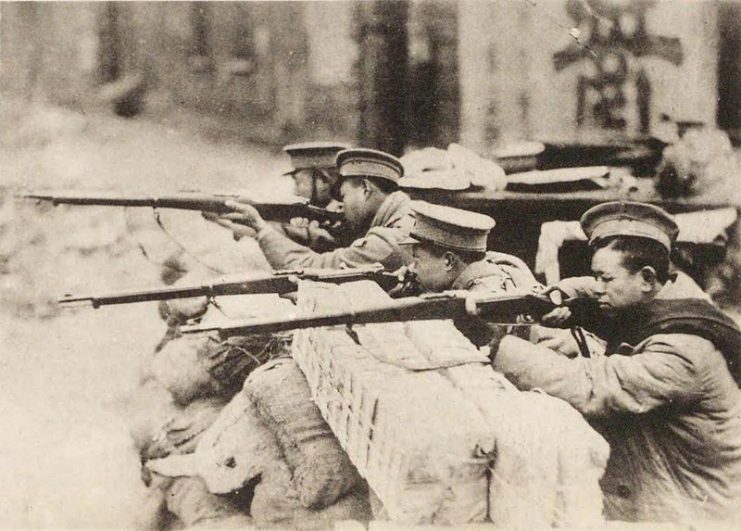 Chinese military police in combat Shanghai Incident.