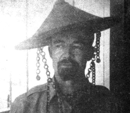 Colonel Fertig wearing red goatee and conical hat in the Philippines during World War II