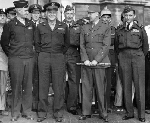 Description: front row (left to right) General Omar Bradley, Eisenhower, General Marie-Pierre Koenig and Air Marshal Tedder in Paris, 1944