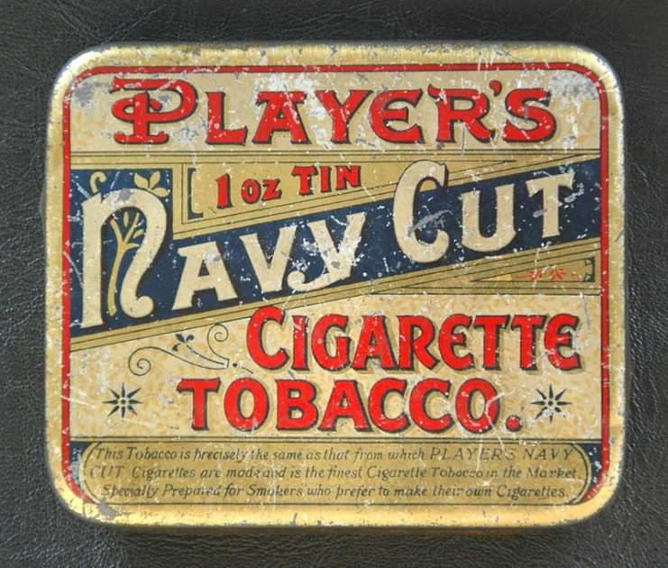 Enamelled metal box for 1 ounce of tobacco- John Player and Sons, Nottingham, England.Photo Motacilla CC BY-SA 3.0