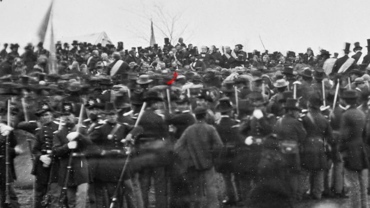 Gettysburg, November 19, 1863. Crowd of citizens, soldiers, and etc., with a red arrow indicating Abraham Lincoln