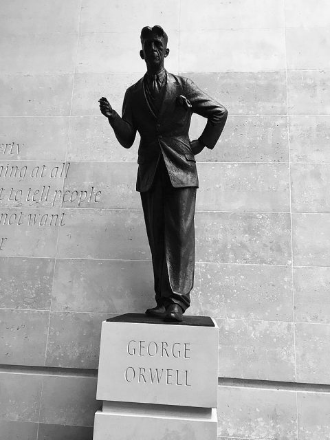 George Orwell statue at the headquarters of the BBC. A defense of free speech in an open society, the wall behind the statue is inscribed with the words “If liberty means anything at all, it means the right to tell people what they do not want to hear”, words from George Orwell’s proposed preface to “Animal Farm” (1945)