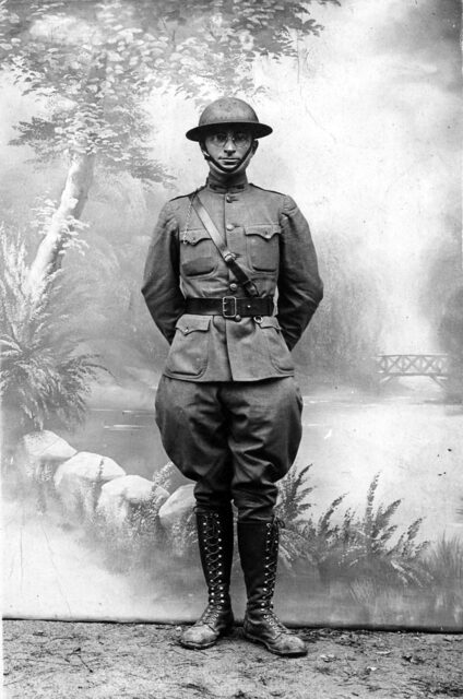 Harry Truman standing in his military uniform