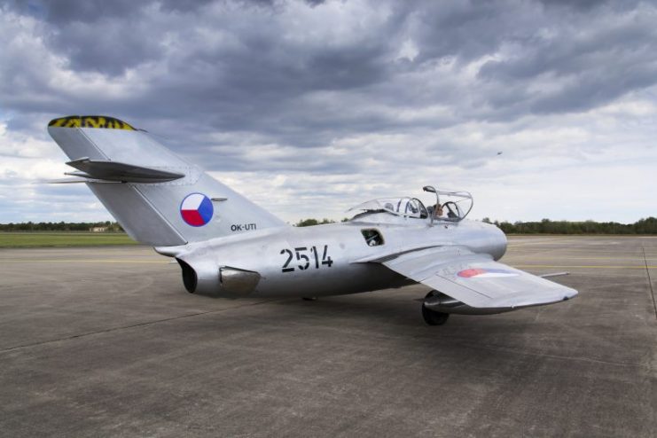 Jet fighter aircraft Mikoyan-Gurevich MiG-15 standing on a runway