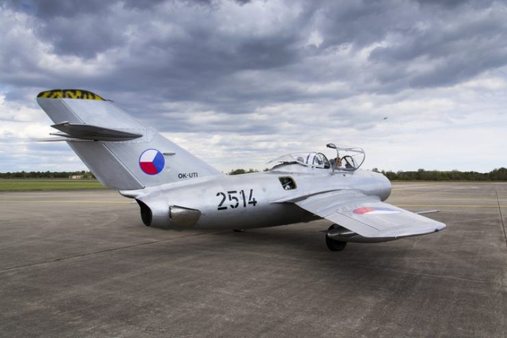 Jet fighter aircraft Mikoyan-Gurevich MiG-15 standing on a runway