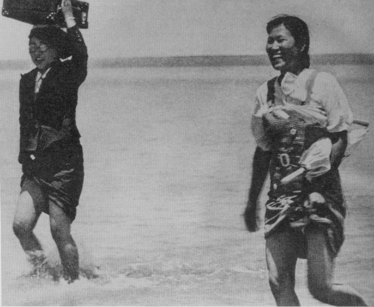 Korean Comfort Women crossing a river following Japanese soldiers.