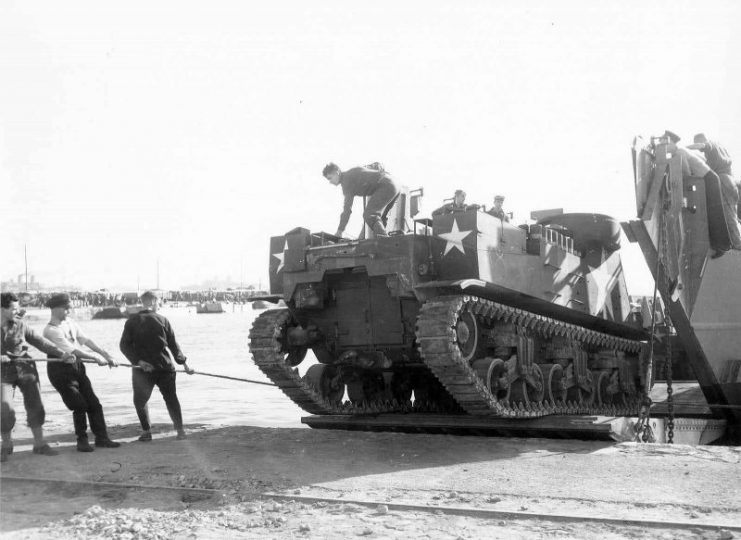 M7 of the 1st Armored Division is being unloaded at Algerian Docks November 9, 1942