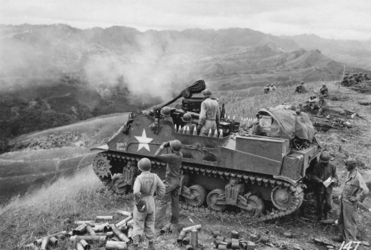 M7 Priest “Super Rabbit” from 40th Infantry Division firing on Luzon hill 1945