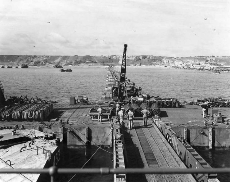 Mulberry harbor A off D-Day Omaha Beach in the background at Saint-Laurent-sur-Mer