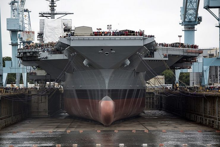 Newport News Shipbuilding begins flooding Dry Dock 12 to float the aircraft carrier USS Gerald R. Ford (CVN-78).