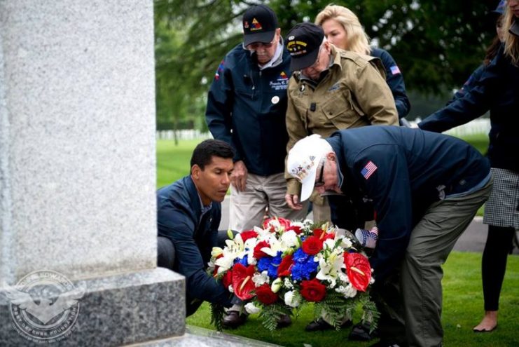 Normandy Veterans Laying Flowers at Memorial in Normandy – Photo Credit – Best Defense Foundation