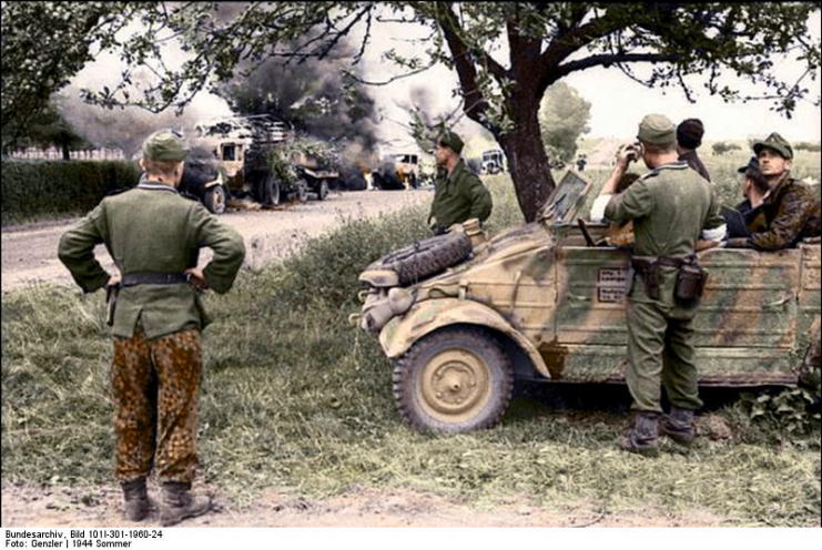 Northern France, soldiers with VW-Kübelwagen Recolored.Photo Genzler CC BY-SA 4.0