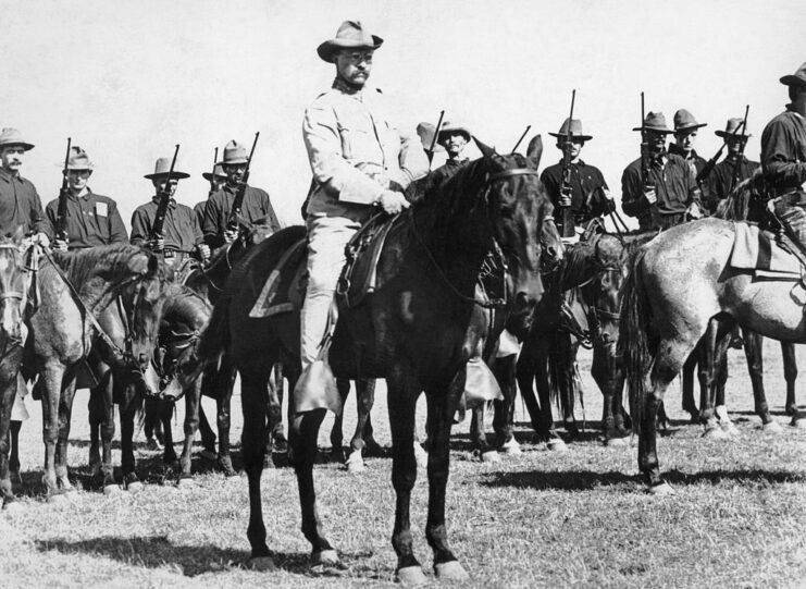 Theodore "Teddy" Roosevelt and his Rough Riders on horseback