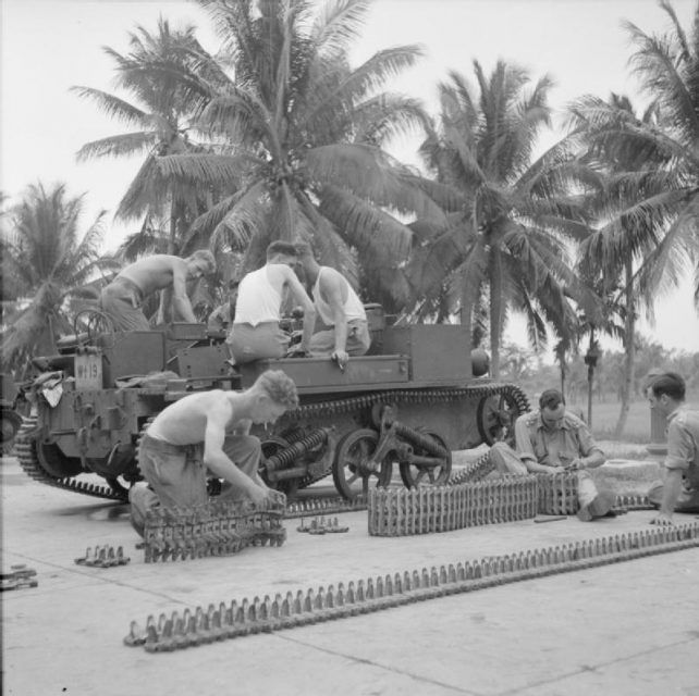 The British Army in Malaya 1941 British troops working on a Bren gun carrier, November 1941.