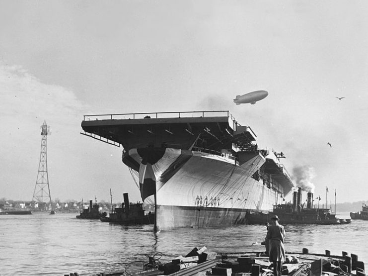 The U.S. Navy aircraft carrier USS Bunker Hill (CV-17) afloat immediately after launching, at the Bethlehem Steel Company’s Fore River Shipyard, Quincy, Massachusetts, 7 Dec 1942.