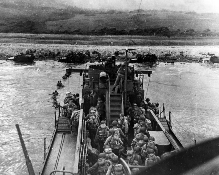 Troops land from USS LCI(L)-412 during the D-Day assault on Omaha Beach, 6 June 1944