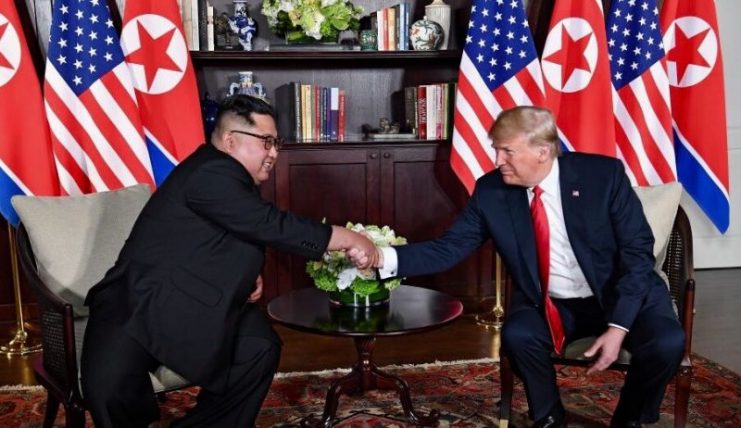 Kim and Trump before the start of their one-on-one meeting