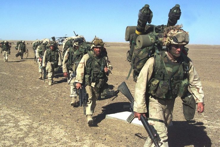 U.S. Marines marching while wearing IBA vests in November 2001, during the War in Afghanistan.