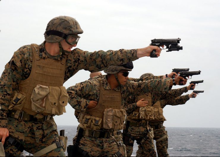 U.S. Marines train with the M9 on board USS Blue Ridge (LCC 19) in March 2005.