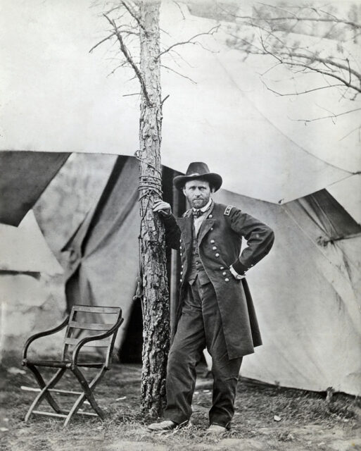 Ulysses S. Grant leaning against a tree