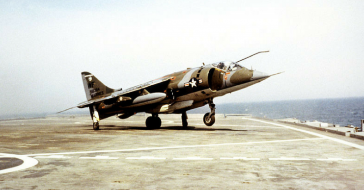 AV-8C Harrier taking off from an amphibious transport dock ship