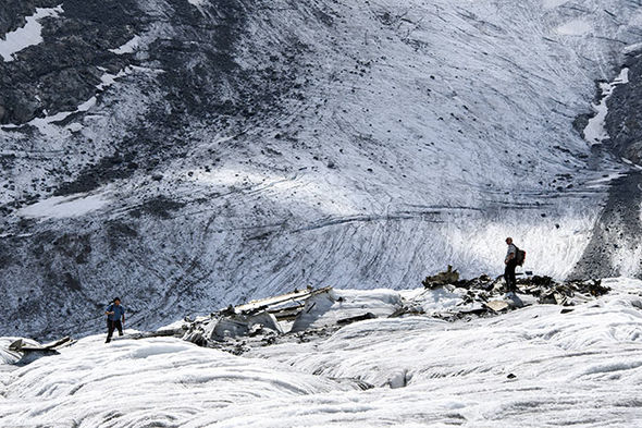 Large skin panels are now being exposed to the sunlight. Stretched along a longer path of aluminum debris, it has the appearance as if the plane has collided or slammed into the glacier and was ripped apart by the crash. Not so, there was a huge metal grinder at work for 70 years. (photos courtesy SRF News)