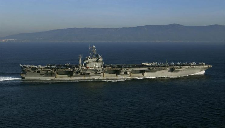 The nuclear powered aircraft carrier USS George Washington (CVN-73) transit the Strait of Gibraltar into the Mediterranean.