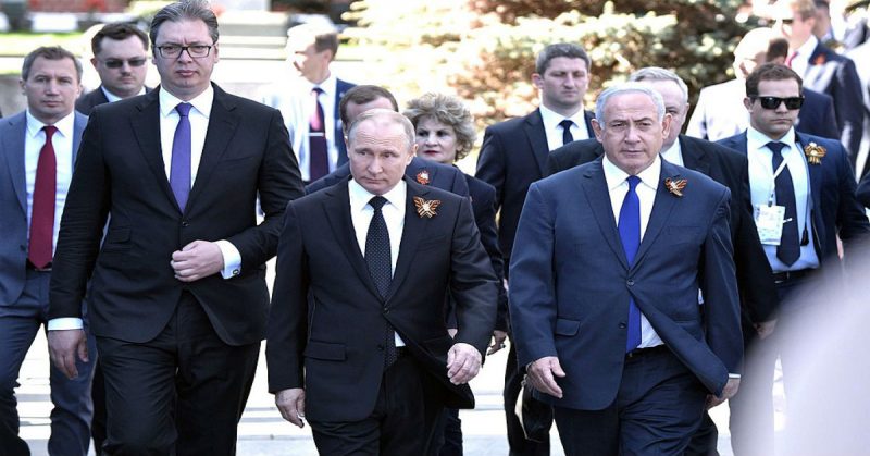 Victory Day Parade with Russian President Putin and Israeli Prime Minister Netanyahu Wearing St. George's Ribbons.