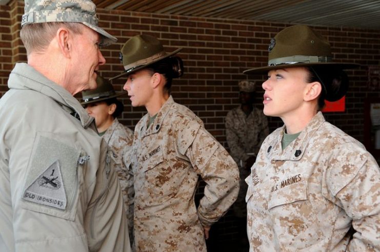 Chairman of the Joint Chiefs of Staff Gen. Martin E. Dempsey talks with U.S. Marine Corps drill instructors at the 4th Recruit Training Battalion, Parris Island, S.C., on March 21, 2013. The 4th Recruit Training Battalion is a female-only unit at Parris Island.