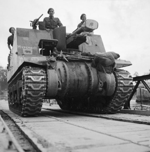 11TH ARMOURED DIVISION ADVANCE OVER THE SEINE, AUGUST 1944. A Sexton 25-Pounder self-propelled gun-howitzer of 11th Armoured Division crosses the Seine for the attack.