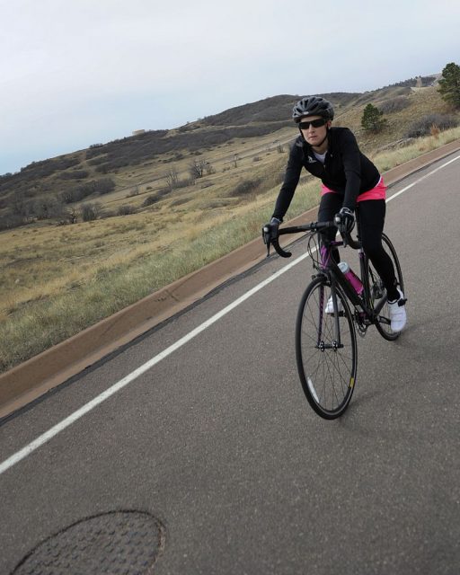 Sgt. Kirstie Ennis with Wounded Warrior Battalion West, from Milton, Fla., cycles during practice at the 2013 All-Marine Warrior Games team training camp on Fort Carson, in Colorado Springs, Colo. The training camp is a two-week camp in order for the Marines to prepare for the 2013 Warrior Games.