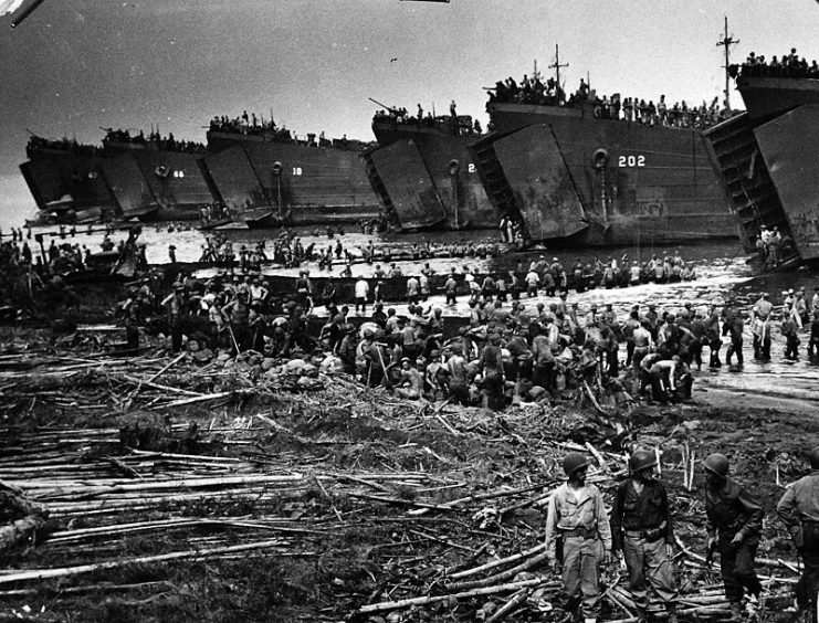 Invasion of Leyte, Philippines, 20 October 1944. Giant Seagoing “Freight Cars” Unload War Cargo on Leyte.