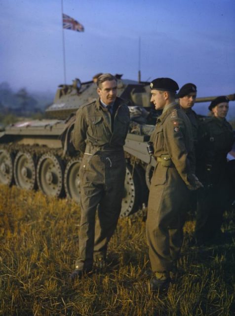 42nd Armoured Division Exercise, Near Malton in Yorkshire, 29 September 1942. The Secretary of State for Foreign Affairs, Mr Anthony Eden, talking to a tank officer of the 42nd Armoured Division during a halt in the large-scale exercise.