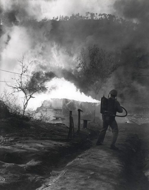 As the First Marine Division advances in Korea, the flamethrower is used to deny communist infiltrators a hiding place.” 5 May 1951 . By USMC Archives CC BY 2.0