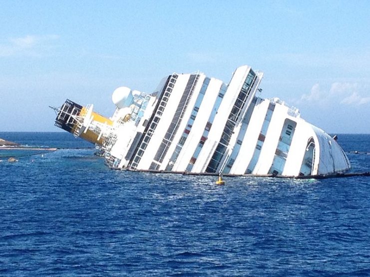 View from the island of the lily of the Costa Concordia ship stranded in front of the island. By paolodefalco75 CC BY-SA 3.0